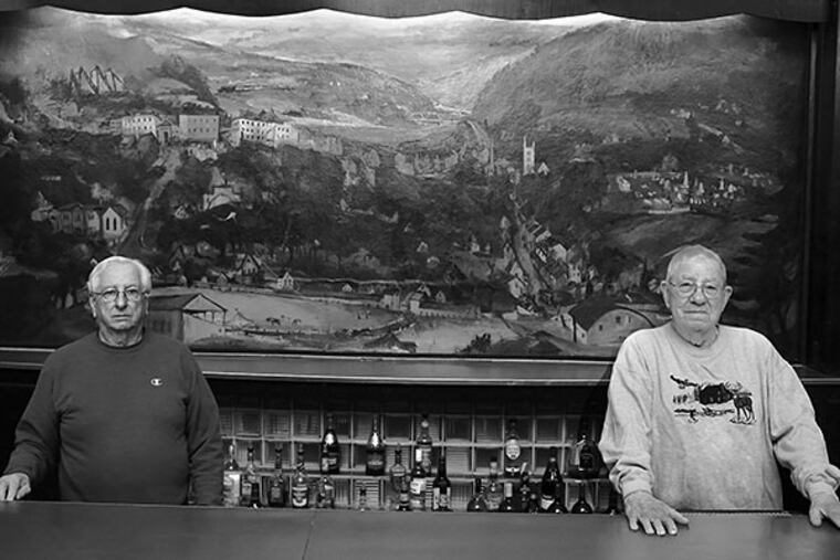 At Legion Post 314 in Lehighton, Floyd Brown (left) and Cornelius McHugh in front of hometown boy Franz Kline's mural. LYNN A. SHUPP