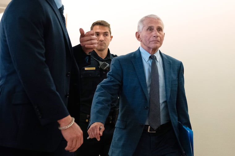 Dr. Anthony Fauci departs after appearing before the Senate Homeland Security and Governmental Affairs Committee hearing at the Capitol, Wednesday, July 29, 2026, in Washington. (AP Photo/Allison Robbert)