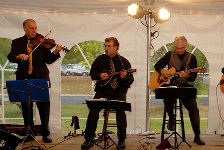 Stringzville, a Hopewell-based acoustic jazz outfit, ideal for house concerts. Left to right: Adam Krass (violin), Bo Child (mandolin), Dennis O'Neal (guitar), Mark Hill (guitar, not pictured), and Kathy Ridl (bass, not pictured). (Photo courtesy Dennis O'Neal)