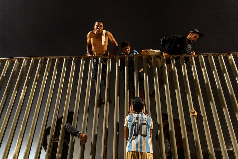 Migrants try to cross from Morocco into the Spanish enclave of Ceuta, Friday, July 31, 2026.