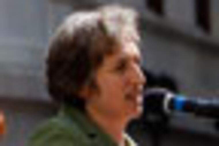 City Commissioner Stephanie Singer, right, holds a press conference on Voter ID in the courtyard of City Hall in Philadelphia, Pa. on August 20, 2012. ( DAVID MAIALETTI / staff photographer )