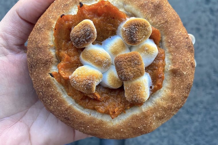 A sweet potato bialy sold around Thanksgiving by Kismet Bagels.