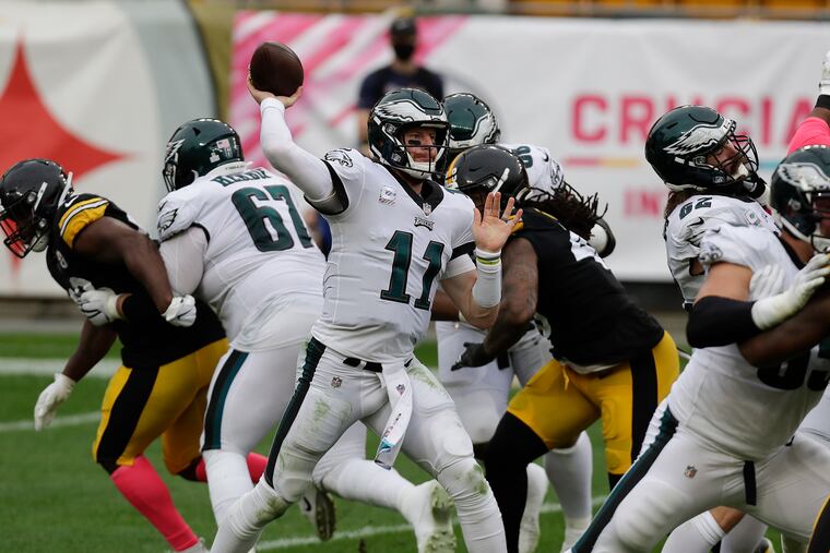 Carson Wentz (11) needs to stand tall in the pocket Sunday against the Ravens.