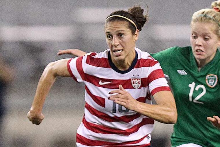 Delran's Carli Lloyd is the only player in Olympic history to score game winning goals in two separate Olympic gold medal matches. (Paul Connors/AP)