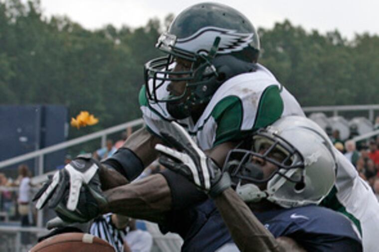 Damon Julian (3) of Winslow Township draws a pass- interference penalty from Timber Creek's Geoffrey Mock.