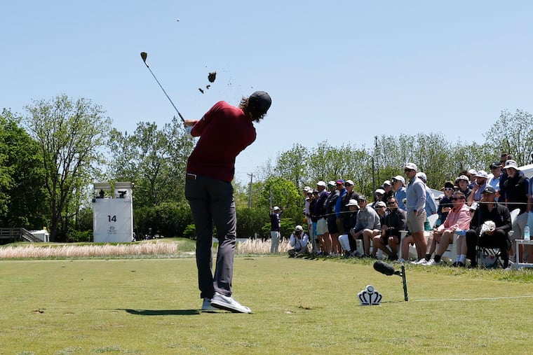 Patrick Rodgers hits his tee shot at the par-3 14th hole during the third round of the 2025 Truist Championship at the Philadelphia Cricket Club on Saturday, May 10, 2025.