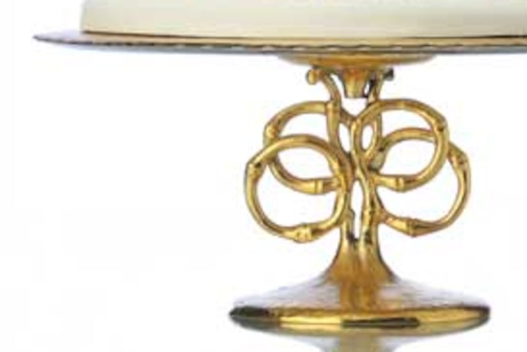 Night Kitchen Bakery cake; golden vine cake pedestal from L’Object.