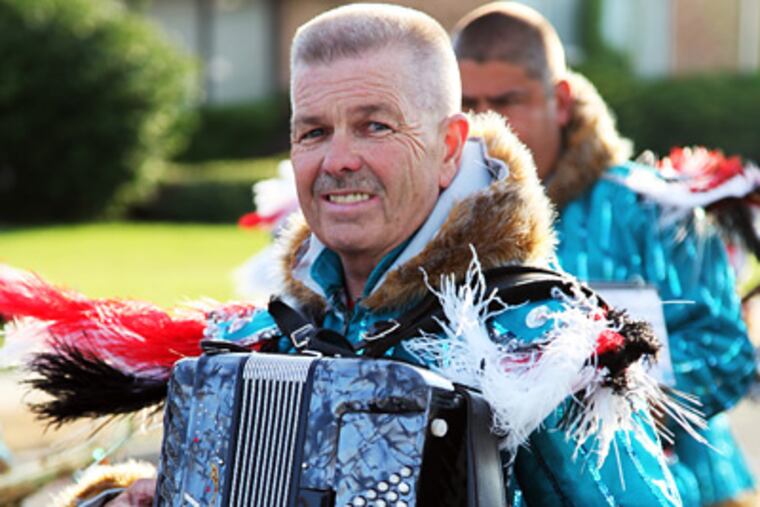 John Hicks and Greater Overbrook String Band wore their winter finery at Gloucester City’s Independence Day parade. (Laurence Kesterson / Staff Photographer)