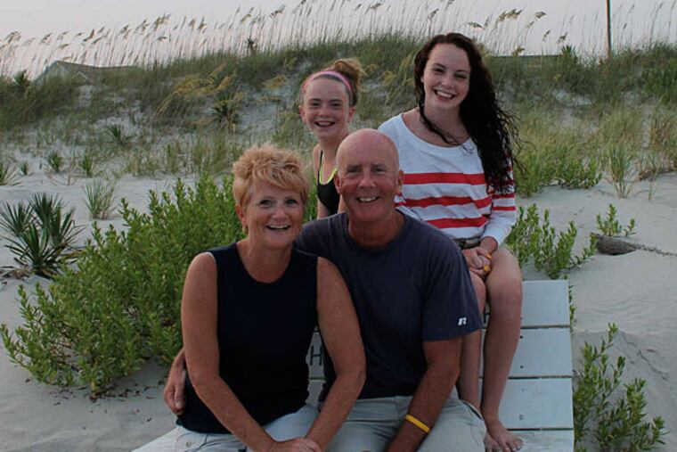 The Kelly family - Kerry and Steve with their daughters, Kacey (left) and Delaney. Steve Kelly wrote about his battle with pancreatic cancer.