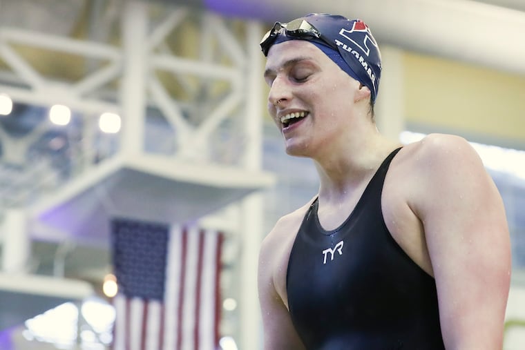 Penn swimmer Lia Thomas smiles after finishing first in the 500 freestyle race during the NCAA women's swimming and diving championships on Thursday. Thomas is the first transgender athlete to win a Division I national title.