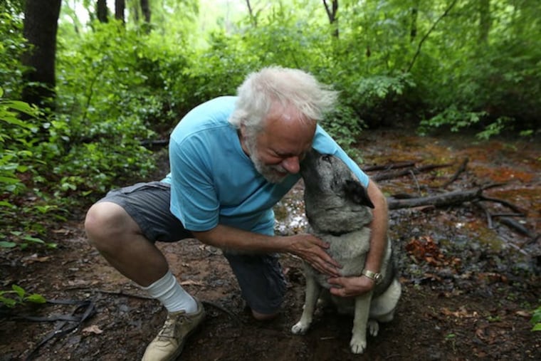 Robert M. Kelley and his dog, Cocoa Bear, in Crows Woods in Haddonfield, site of an earlier, more elemental adventure.
