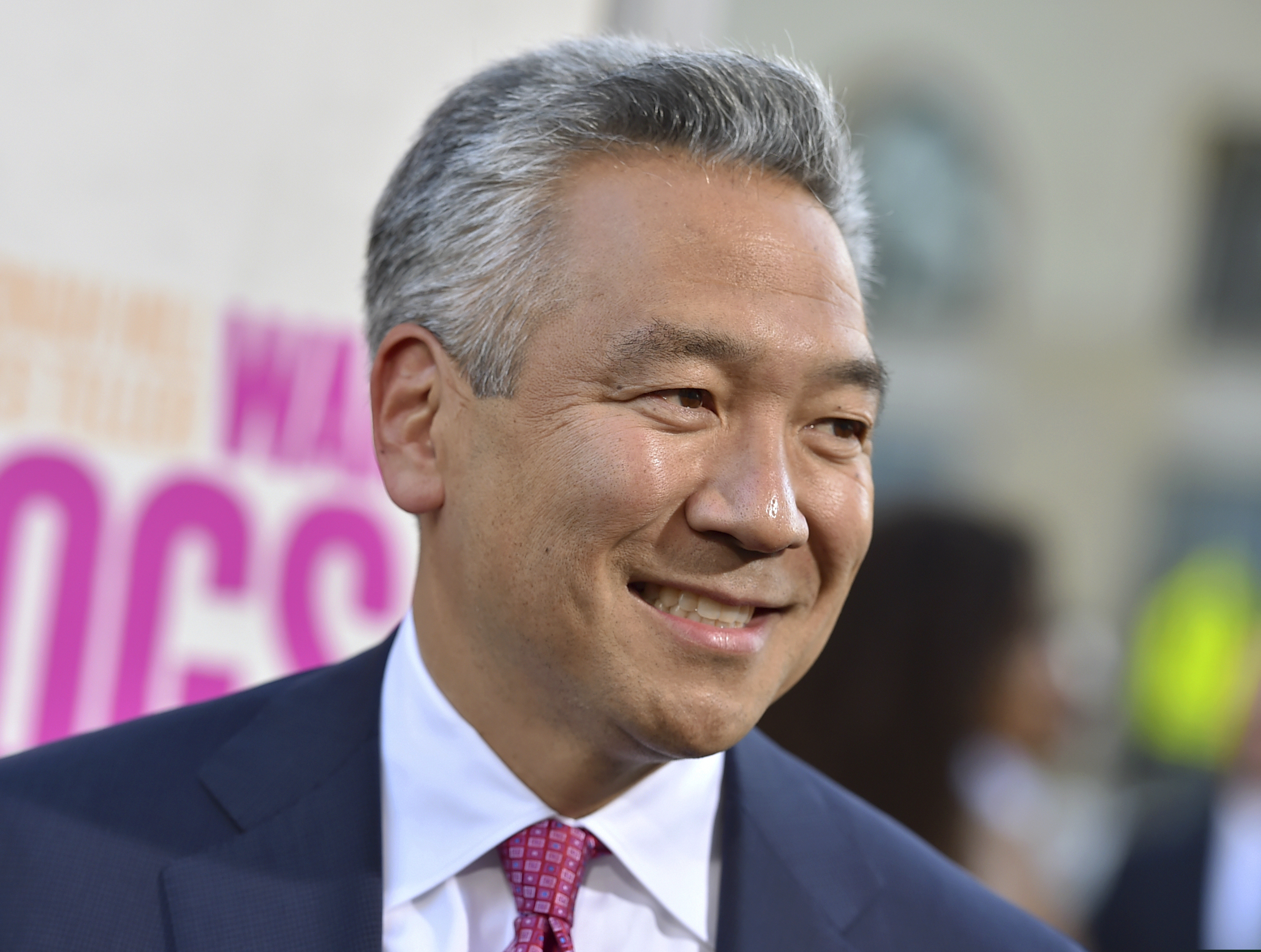 FILE - In this Aug. 15, 2016 file photo, Kevin Tsujihara, chairman and CEO, Warner Bros. Entertainment, arrives at the Los Angeles premiere of "War Dogs." Tsujihara is stepping down after claims that he promised acting roles in exchange for sex. As Warner Bros. chairman and chief executive officer at one of Hollywood’s most powerful and prestigious studios, Tsujihara is one of the highest ranking executives to be felled by sexual misconduct allegations. (Photo by Jordan Strauss/Invision/AP, File)