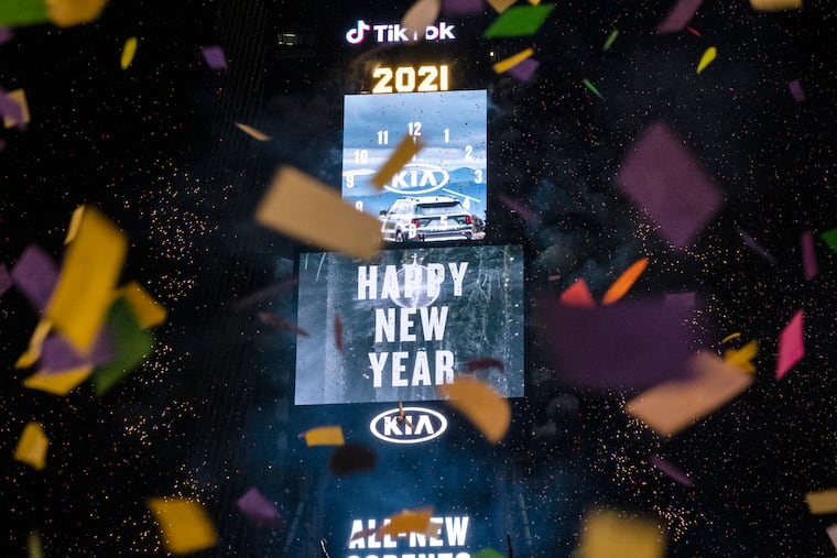 Confetti flew after the Times Square New Year's Eve Ball dropped in a nearly empty Times Square on Jan. 1, 2021.