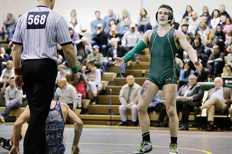 Clearview's Stanley Atkinson (right) wins by decision over St. Augustine's Dillon Taylor.