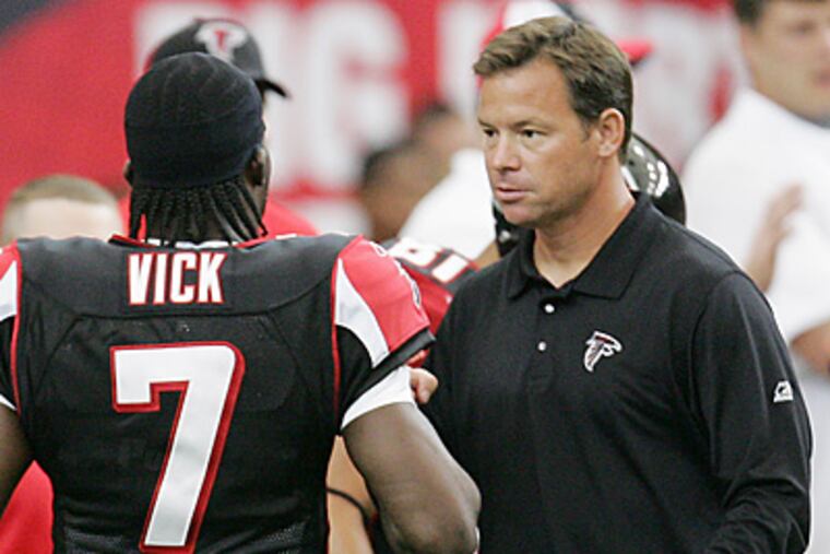 Jim Mora coached Michael Vick while he was in Atlanta. (AP File Photo/Ric Feld)