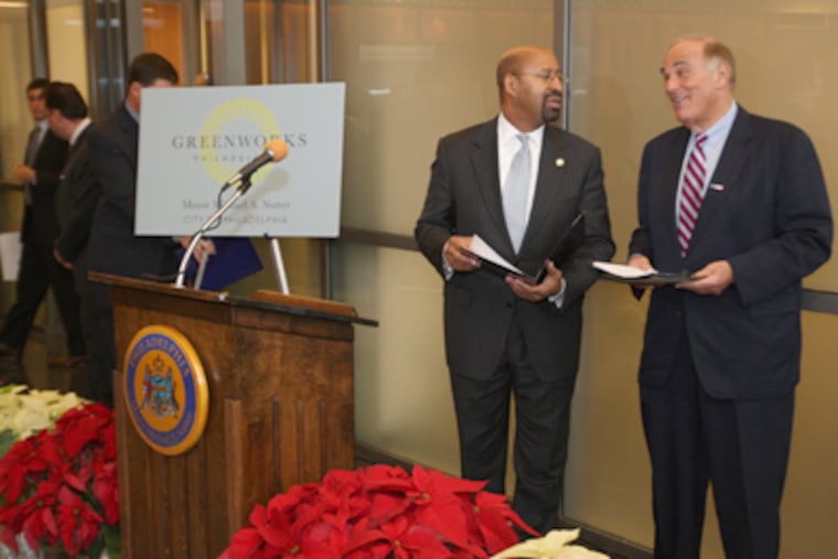 At a news conference in 2009, Mayor Nutter and Gov. Rendell prepare to announce the solar-panel plant. China's huge increase in solar-cell capacity has added to the market’s upheaval. (Michael Bryant / Staff Photographer)