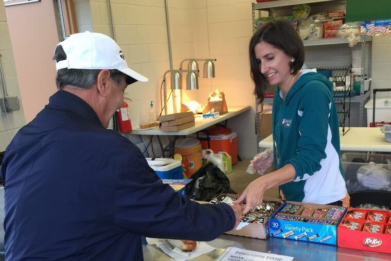 Noel Dolan at work in the snack bar.