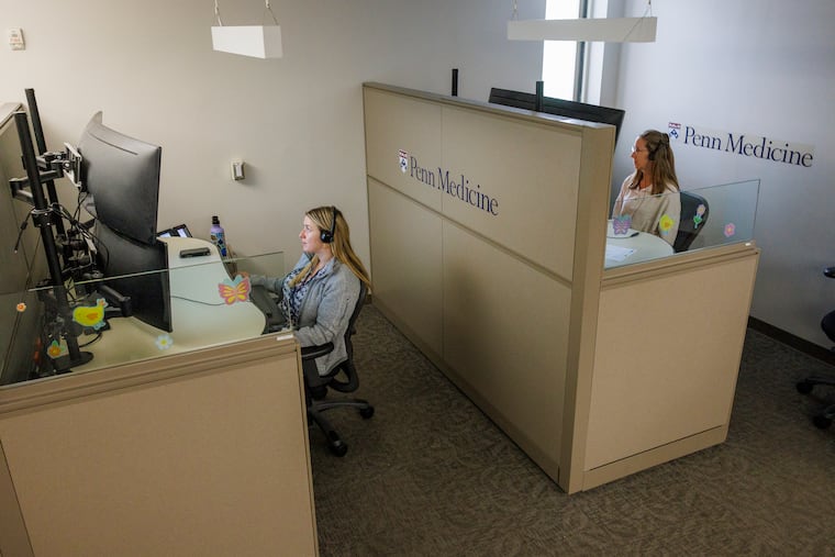 Registered nurses working in the Center for Connected Care at Penn Medicine's Rittenhouse Square offices monitor patients through the system's virtual nursing program.