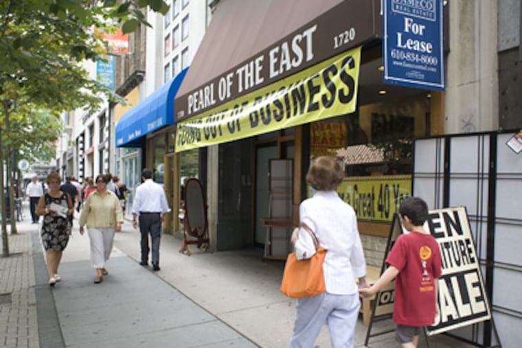 A banner tells Pearl of the East’s story. It moved from Walnut in 2004 due to rent, but low sales spelled its end. (Ed Hille / Staff Photographer)
