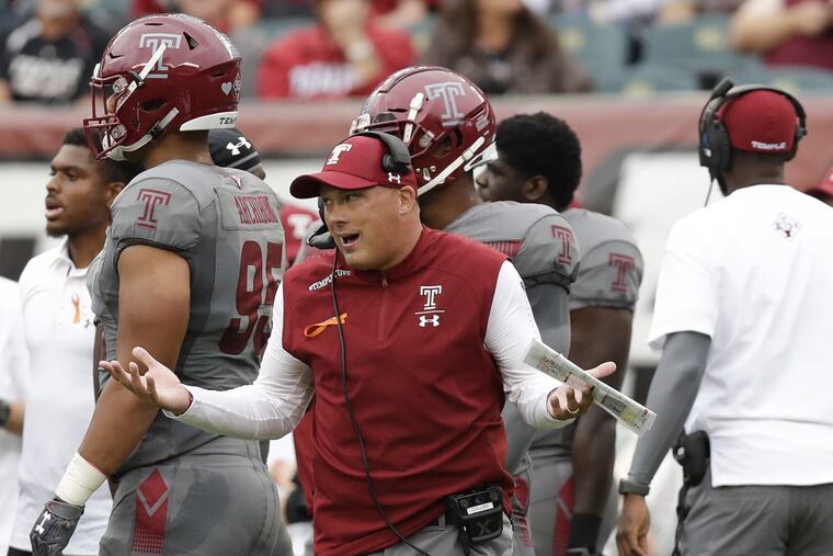 Temple head coach Geoff Collins raises his arms against Buffalo on Saturday, September 8, 2018. YONG KIM / Staff Photographer