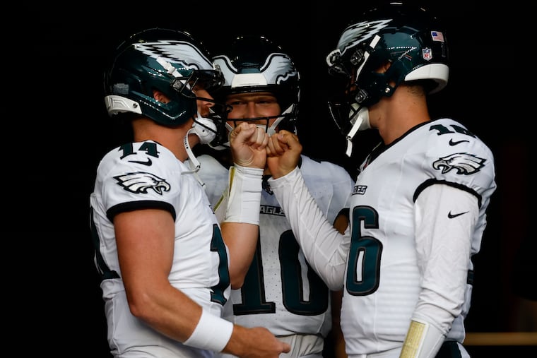 Eagles quarterbacks Andy Dalton (left), Cole Payton (center) and Tanner McKee will likely encounter some kind of depth chart shake-up over the next week.