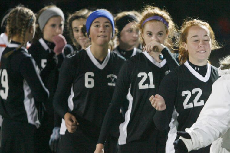 Jess Hickey (21) and her Bishop Eustace teammates prepare to shake hands with West Essex after the Crusaders' loss in the Group 2 state field hockey championship at Toms River East.