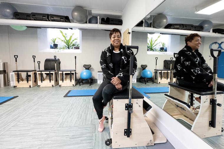 Business owner Valerie Plummer poses for a photo in her Germantown pilates studio. It's been a profitable year for her business, she said, and she's optimistic about 2026.