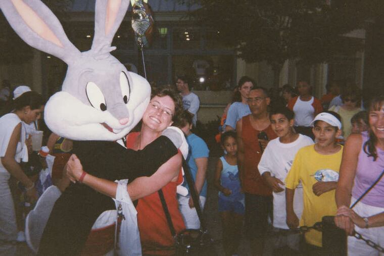 Bugs Bunny hugs a fan. Philadelphia writer Megan Ritchie Jooste found wearing the costume an eye-opening experience.
