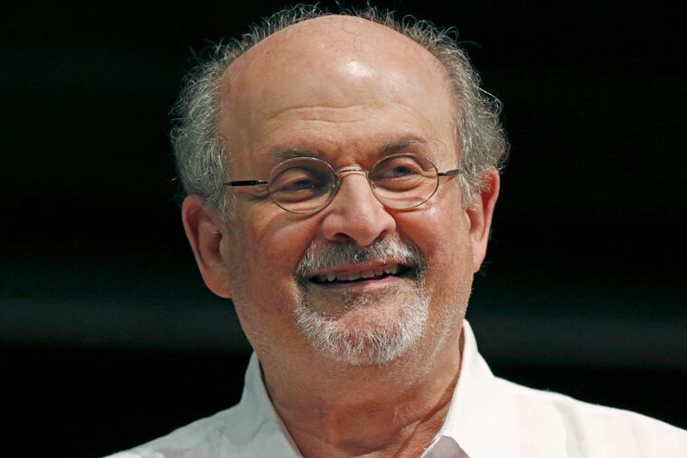 Author Salman Rushdie appears during the Mississippi Book Festival in Jackson, Miss., on Aug. 18, 2018. The U.S. is imposing financial penalties on an Iranian-based organization that raised money to target British-American author Rushdie, who was violently attacked at an August literary event.