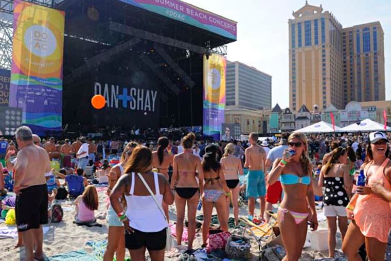 Opening act Dan + Shay (Dan Smyers and Shay Mooney) perform before Blake Shelton concert July 31, 2014 as Atlantic City holds its first MEGA free beach concert since the Beach Boys in 1983. ( TOM GRALISH / Staff Photographer )