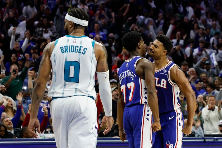 Sixers guard Quentin Grimes (right) reacts after making a three-point basket with 15 seconds left in a win over the Hornets.