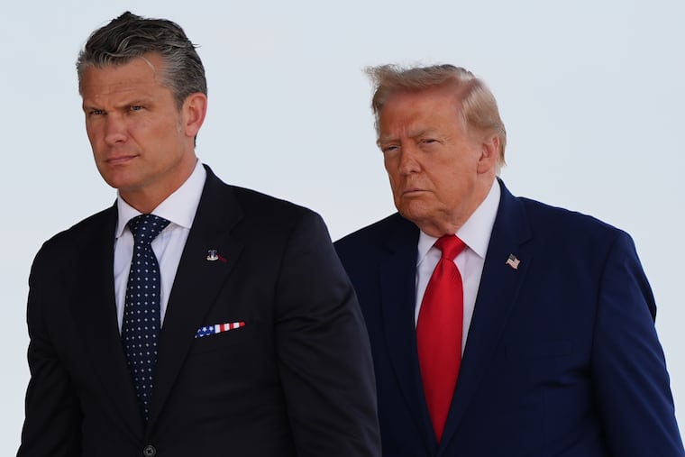 Defense Secretary Pete Hegseth and President Donald Trump attend the dignified transfer of four U.S. service members recently killed in the Middle East at Dover Air Force Base, Del. last month.