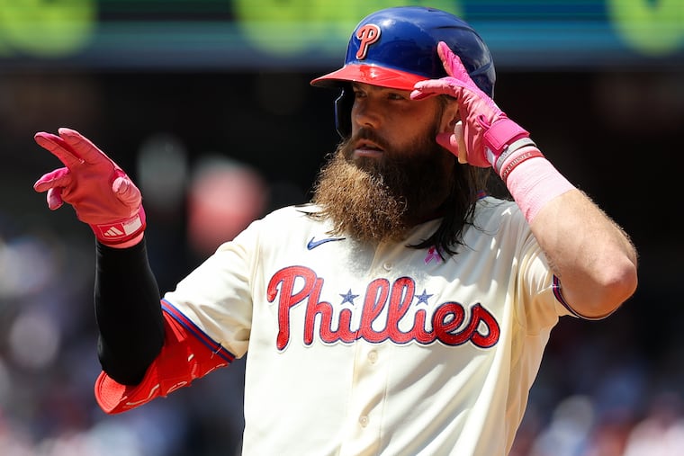 After enduring a rough stretch early last season, Brandon Marsh (16) has rebounded to become MLB's top hitter.