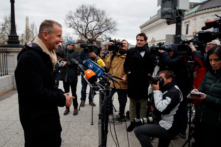 Volkswagen Group CEO Herbert Diess talks with reporters after meeting with President Donald Trump at the White House, Tuesday, Dec. 4, 2018, in Washington. (AP Photo/Evan Vucci)
