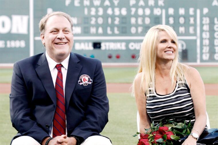 Curt Schilling with his wife, Shonda. (AP Photo)