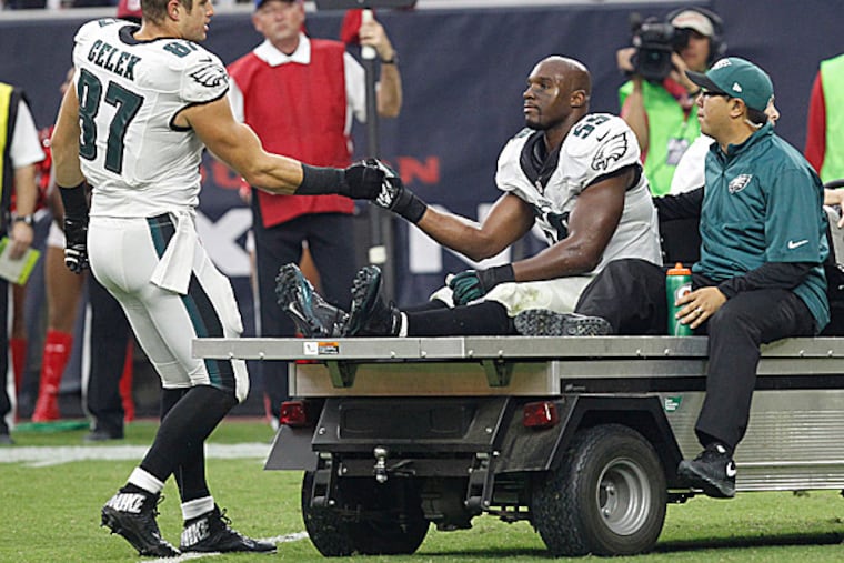 Eagles tight end Brent Celek and linebacker DeMeco Ryans. (Ron Cortes/Staff Photographer)