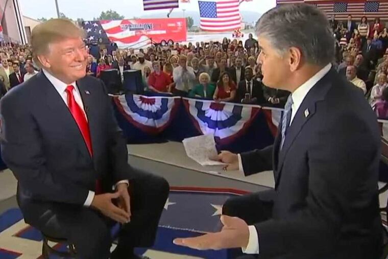 Fox News host Sean Hannity interview President Trump ahead of a rally in Middletown, Pa., on Oct. 11, 2017