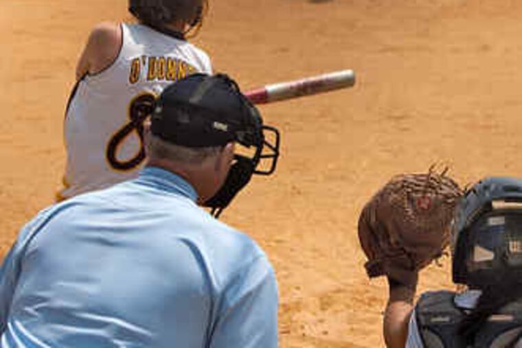 Gloucester Catholic's Colleen O'Donnell hits a grand slam in the second inning off Sacred Heart's Kylie Kristovich. She had two other hits and drove in seven runs.