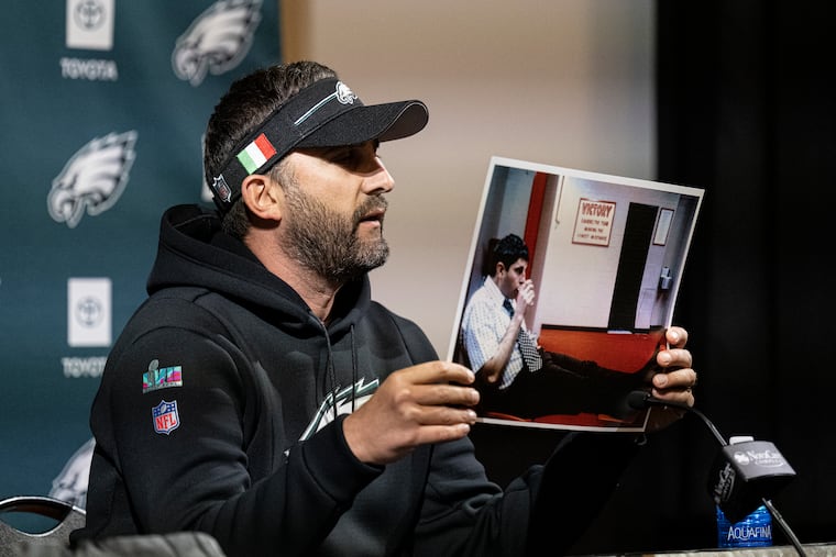 Eagles head coach Nick Sirianni shows off a Bobby Knight poster on Friday.