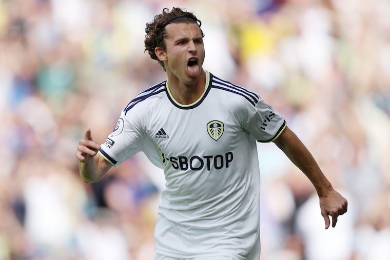 Brenden Aaronson celebrates scoring for Leeds United against Chelsea.