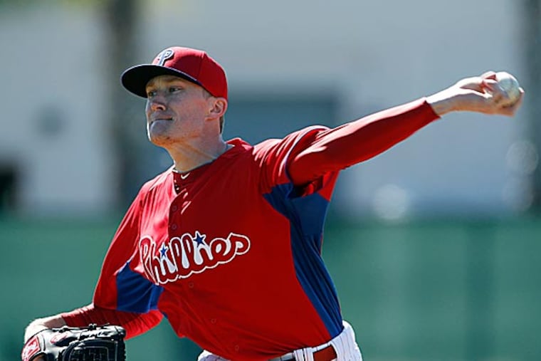Jake Diekman and Justin De Fratus were optioned to minor-league camp. (Yong Kim/Staff Photographer)