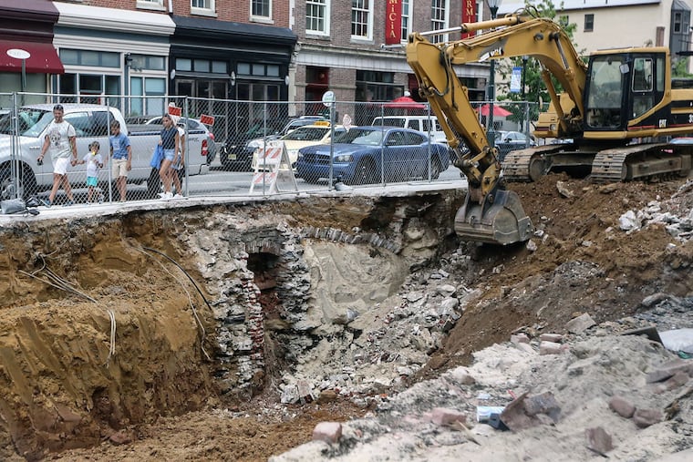 Excavation reveals one of the two brick arches that were under the Suit Corner at Third and Market Streets. A jail was on the site in the 18th century — and it’s possible the construction even predates the Revolution.