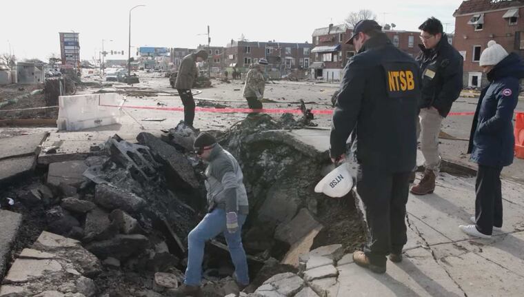 NTSB images of investigators at the scene of Friday's plane crash