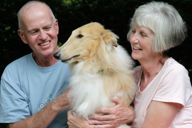 Steve and Karen MacKay and their dog, Hannah, at their Pitman home. (AKIRA SUWA/Staff Photographer)