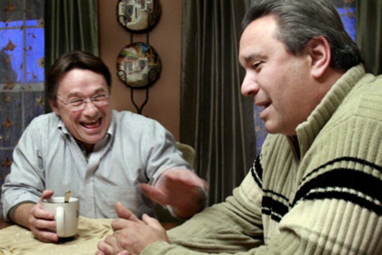 Larry Wallace (left) and Vince Nestore Jr., new members of the Gloucester County Board of Freeholders, talk politics in Wallace's Woolwich home. (Elizabeth Robertson / Staff Photographer)
