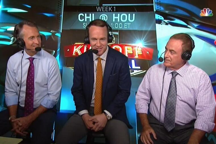 Peyton Manning (center) more than held his own in the booth alongside NBC’s Cris Collinsworth (left) and Al Michaels (right) during the NFL’s 2016 season opener.