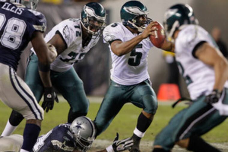 Donovan McNabb, seen here about to be sacked last November by the Cowboys' DeMarcus Ware, would do well to utter a Yo' Mama comment Monday night to draw a penalty from the linebacker.