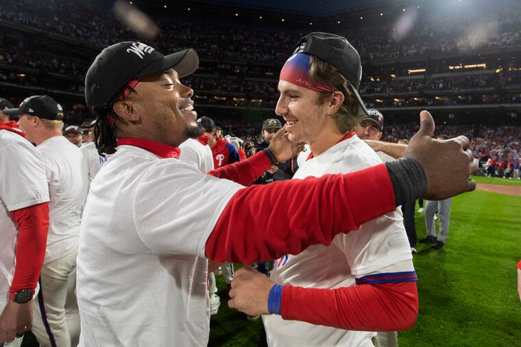 Jean Segura and Bryce Stott celebrate their victory over the Padres in Game 5 of the National League Championship Series on Oct. 23.