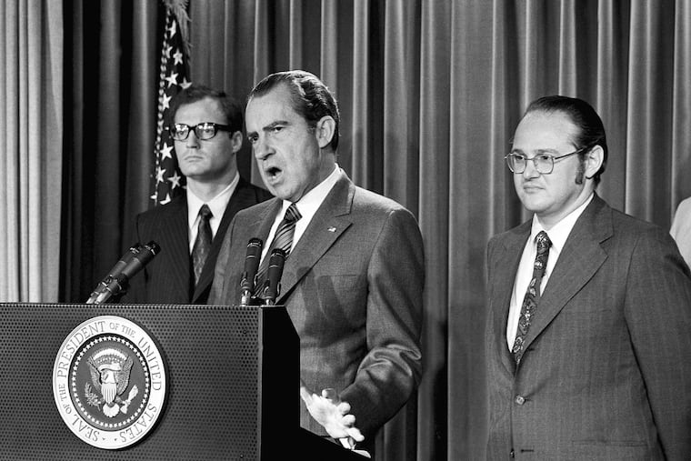 In this June 1971 file photo, President Richard Nixon (center) explains his request for an extra $155 million from Congress to combat the use of drugs, an issue he labeled "a national emergency."