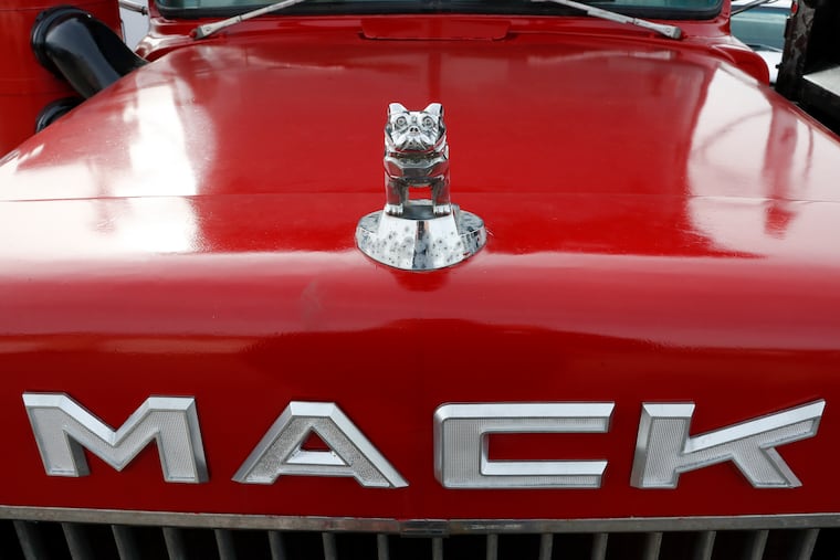 The bulldog hood ornament is seen on a used Mack truck that is available at a lot in Evans City, Pa., in 2020.